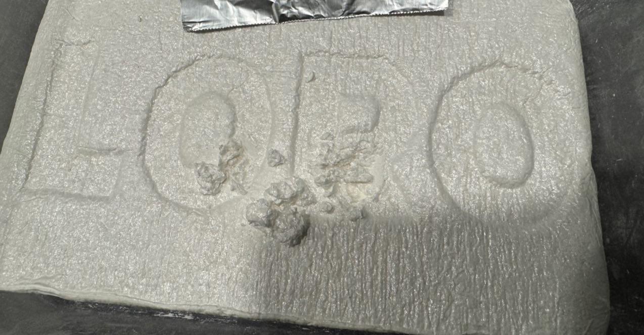 Coke/Loro Stamp